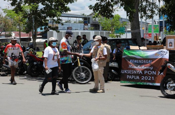 Sukseskan PON XX 2021 Papua, Kemendagri Masifkan Gerakan Pembagian Masker